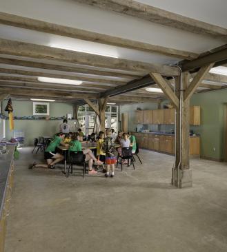 The+Timber-Frame+Barn%e2%80%99s+lower+level+was+conditioned+for+year-round+use+with+high-performance+spray-foam+insulation+and+a+new+energy-efficient+radiant+slab+heating+system.+