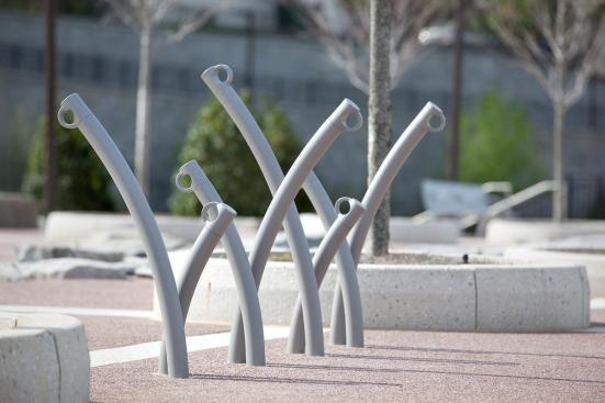 Bike Garden Bike Racks shown in cast-in-place configuration with Aluminum Texture powdercoat at Historic Fourth Ward Park, Atlanta, Georgia