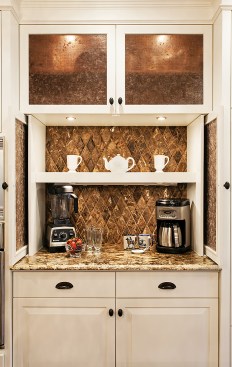 After: The new breakfast bar can be concealed with slide away doors with textured wire glass. 