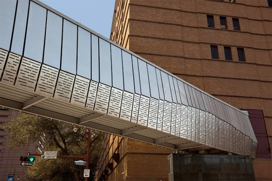 Bridge upper panels in Stainless Steel with Sandstone finish and custom Eco-Etch pattern; lower panels in Stainless Steel with Sandstone finish and custom screen pattern at the Houston Ballet Center for Dance, Houston, Texas