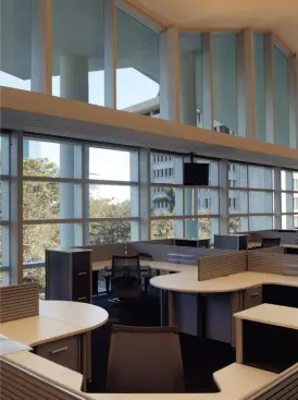 The bulk of the newspaper's employees work in the second and third floor newsrooms, connected by a large open stairwell to promote ready circulation between departments. The third floor ceiling is shaped by the folds of the roof, lending a sense of sculpture to the sea of cubicles. Improv TAG task chair - Haworth - www.haworth.com Molded polyfoam contoured seat cushion - Hard, dual-wheel casters - Pneumatic seat adjustment - High-arc, five-prong molded plastic base - Optional two-position back lock