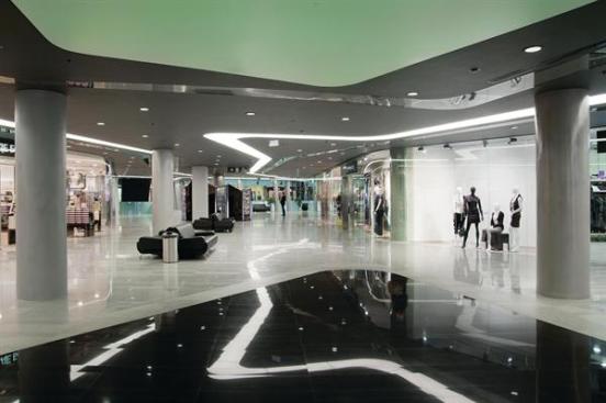 A typical retail floor has storefronts and kiosks, paired with places to sit and meet people, as many of Surgut?s residents use the space less for directed shopping, and more as a community hub.