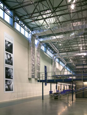 Clerestory windows bring natural light into the warehouse