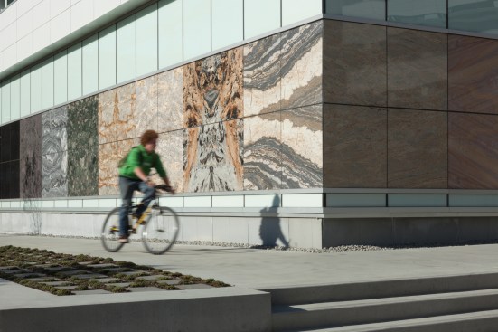 The exterior curtainwall on the west elevation incorporates stone for teaching and display.