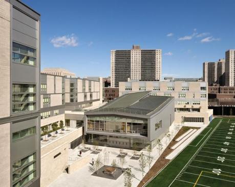 Aerial view of shared performaing arts building and adjacent sports field