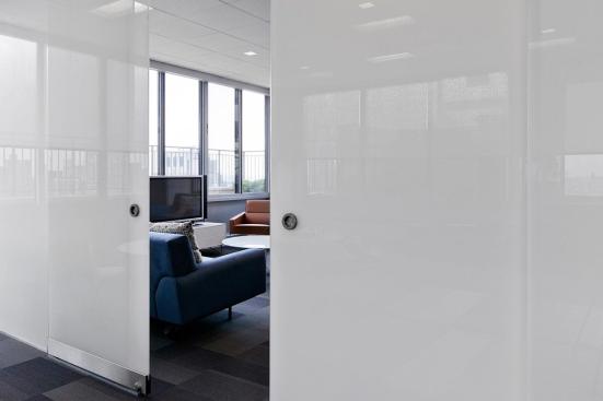 Partition wall and doors in ViviGraphix Gradiance glass with Scatter interlayer and Standard finish at Gracie Mews Pool & Health Club, New York, New York