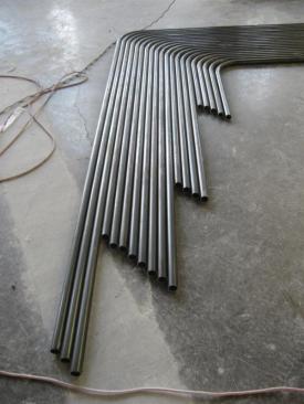 Pipes+of+varying+lengths+used+to+create+column+trees.+