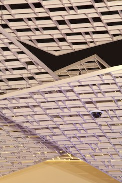 Chicago Metallic's Magna T-Cell ceiling system provides integration with essential lighting, air diffusers, audio accessories and security cameras