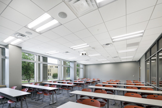 ROCKFON Tropic acoustic ceiling panels achieve an NRC of 0.85 with no upcharge. Installed in Chicago Metallic 4500 Ultraline heavy-duty bolt-slot suspension system, the ASU’s HSS building arrived at a cost-effective, complete ceiling system.