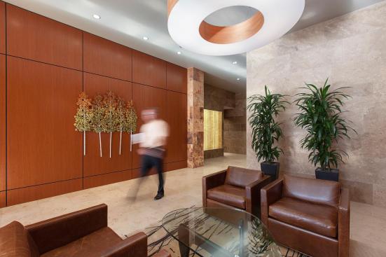 LightPlane Panels in ViviStone Honey Onyx with Pearlex finish shown illuminated at the Woolworth Building, Eugene, Oregon