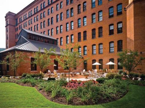 The one-time cork factory is now home to 297 loft apartments with over 47,000 square feet of retail. The firm even saved the historic silo and incorporated it into the project.
