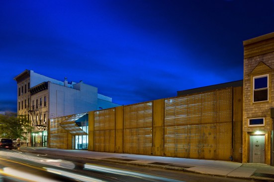 The shop glows at night.