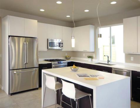 Energy Star appliances, low-flow faucets, and high-efficiency toilets are standard in the units.