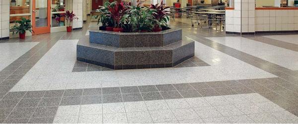 Terrazzo Floor Tile Wausau Tile - www.wausautile.com Wausau's traditional terrazzo line includes 40 standard colors and the option for custom coloring. Tiles come standard in 12-inch, 16-inch, and 24-inch squares. Edging options include square and chamfered, and thickness varies by length and width dimensions.