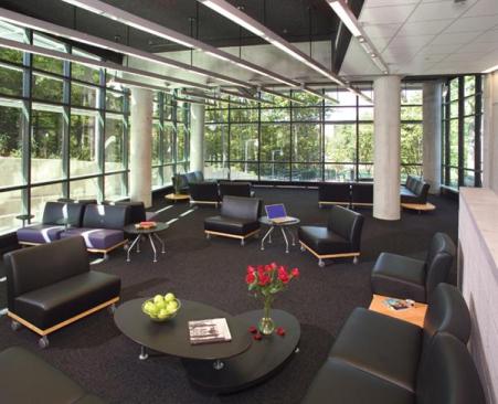 The main lounge and lobby area starts at the lowest end of the site and steps up the hill, resulting in a two story tall space.