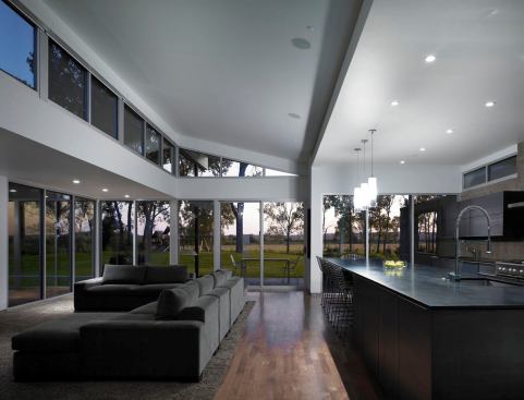 The great room enjoys a broad view of the Missouri River. A south-facing clerestory directs daylight deep into the kitchen area.