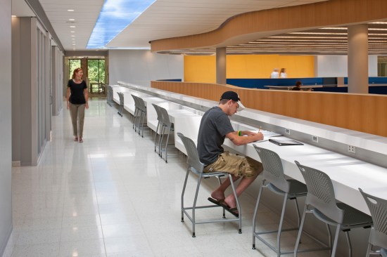 Adjacent to classrooms, the study counter provides places for students to work before and after class.