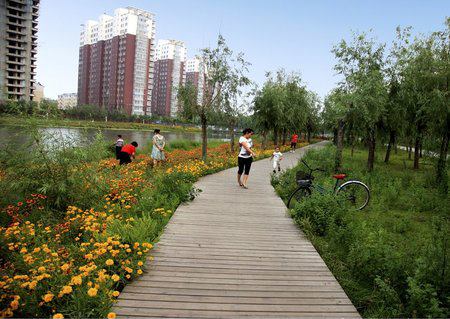 A Mother River Recovered: The Sanlihe Greenway  Qian’an City  This 8.3-mile ecological corridor diverts water from the Luan River through the City of Qian’an. As part of the project, Chinese landscape architecture firm Turenscape replaced sewage pipes that discharged into the Sanlihe River with a passive, natural-infiltration system.