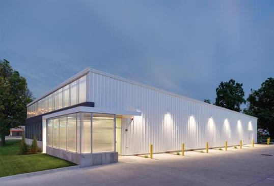 Standard metal components make up the body of the building.