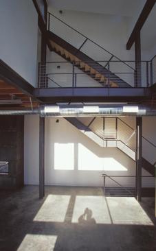Raw but refined: The new lofts have the hard edged, wide open spaces of an old factory. The architect chose materials concrete slab floors, carbon steel fireplaces that will slowly rust for their functional value and honest aesthetic.