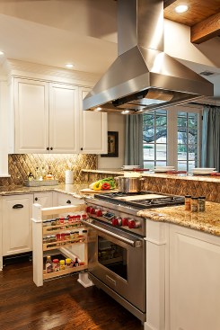 After: Hidden pillar spice racks flank the new Wolf range.