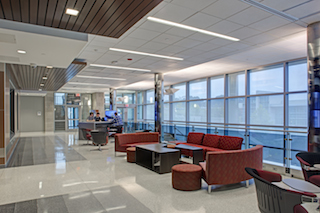 The building was designed to promote a high sense of connection to the outdoors from within and to heighten a sense of transparency from the outside.