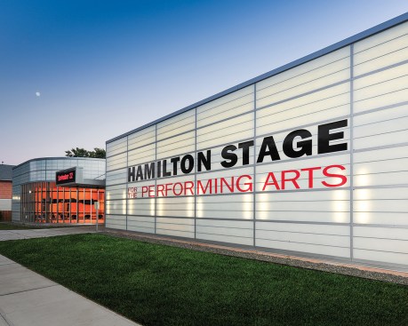 Hamilton Stage is the pinnacle of the renovation and expansion of a circa 1920 industrial building for use as a performance venue. A Kalwall translucent Wall System creates a dramatic glow, drawing attention to the excitement within the structure.