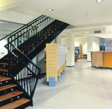 To help defray costs, the architects built the lobby's mailboxes and reception desk.