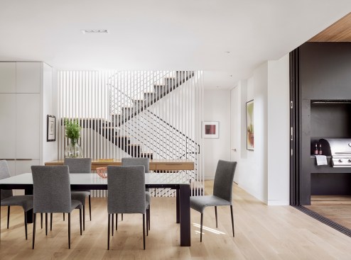 The primary kitchen shares space with a dining area. 