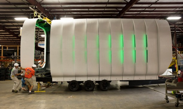The modular panels are joined to form rings and the rings lined up to realize the tube-shaped shelter.