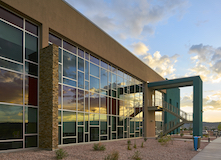 The curtainwall and storefront systems' lattice pattern of aluminum framework enhances the building's attractive appearance.