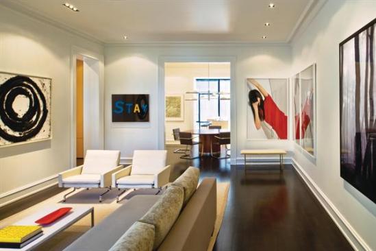 Gurney enlarged the 1876 homes rooms to better suit them to the clients modern art collection. He kept the original woodwork profiles within the existing footprint. 