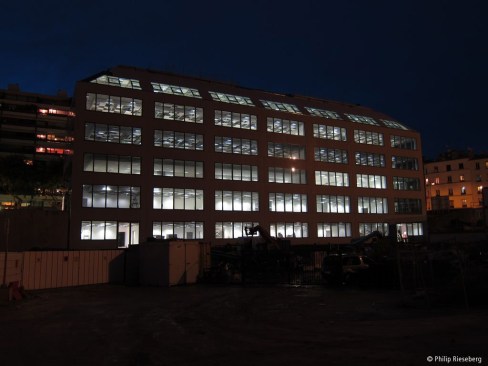 West facade at night.