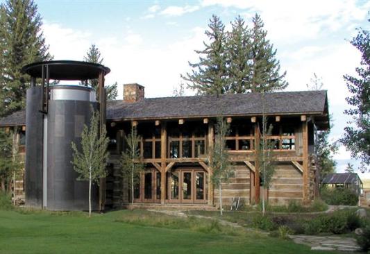 This silo, which was inspired by a wine cask, stores bottles around the perimeter. A spiral staircase leads to a rooftop deck and stunning views.