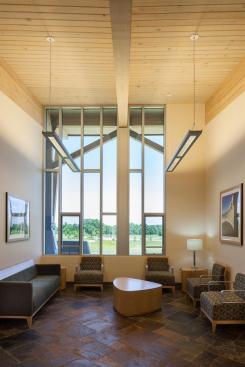The+Welcome+Center+interior+offers+views+of+the+surrounding+landscaped+cemetery.