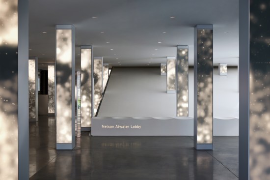 Nelson Atwater lobby identity illuminated signage integrated into the Corian bench