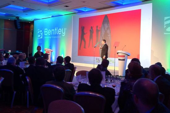 Chris
Barron, Bentley's senior vice president of corporate marketing, opened
the Be Inspired awards program with a tune that linked London, James
Bond, and infrastructure.