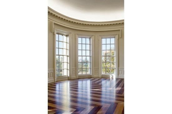 Unfurnished replica of the Oval Office.