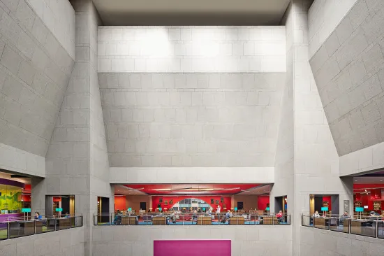 The existing atrium was one of the most challenging spaces to relight because the three-story space was so tall and there was no way to conceal fixtures.