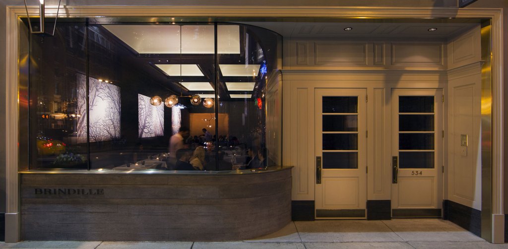 Brindille’s curved façade lends to subdued, intimate interior that complements the restaurant’s namesake tree-branch theme.