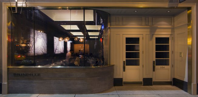 Brindille’s curved façade lends to subdued, intimate interior that complements the restaurant’s namesake tree-branch theme.