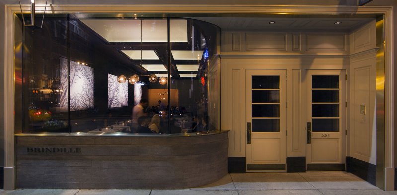 Brindille’s curved fa&ccedil;ade lends to subdued, intimate interior that complements the restaurant’s namesake tree-branch theme.