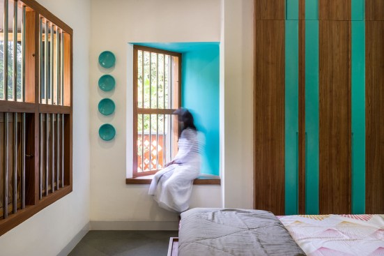 Bedroom 01 follows Carribean Green as its base colour, bay window was tilted away from the front gate of the plot to attain a certain degree of privacy