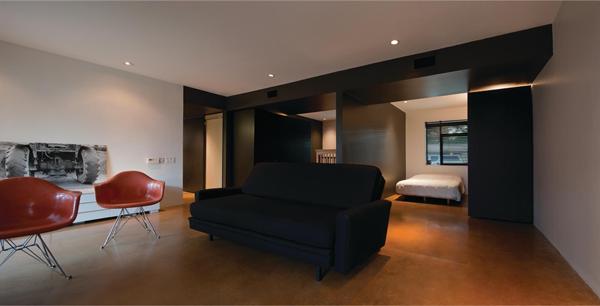 Moving a millwork component incorporates a bedroom space into the playroom.