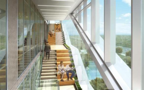 Interiors feature perimeter stairs, integrated seating and gathering spaces with views to the surrounding, picturesque landscape.