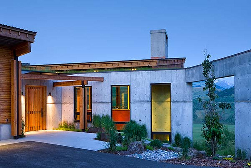 Exterior, horizontal, front entry at twilight, Landes-Oatey residence, Jackson, Wyoming; Ward + Blake Architects