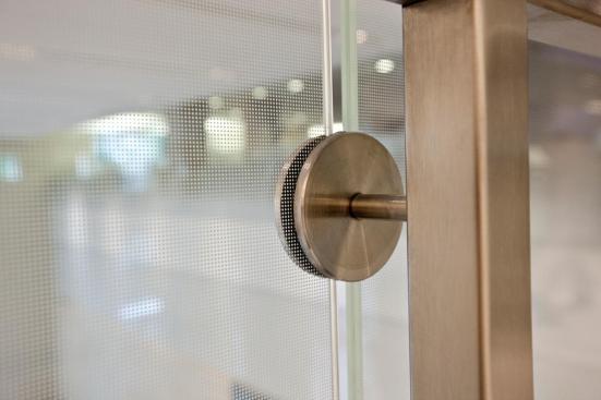 Railing infill in ViviGraphix Gradiance glass with Dot Mini Fade interlayer and Standard finish at HSBC Bank, New York, New York