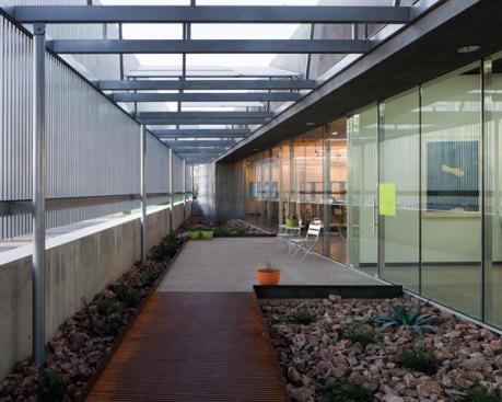 The entry also offers a tranquil courtyard with a rock garden.