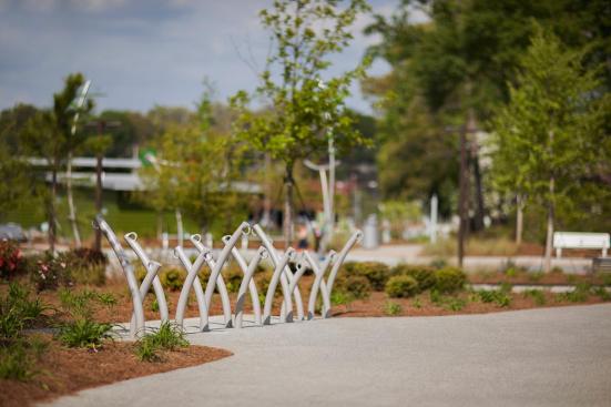 Bike Garden Bike Racks shown in cast-in-place configuration with Aluminum Texture powdercoat at Historic Fourth Ward Park, Atlanta, Georgia