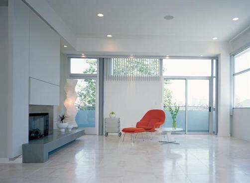 Kanner speced smooth white plaster painted to make the exterior feel even lighter and brighter. Kanner ensured they were all the same so there "would be continuity from the outside."